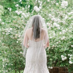 Brand new fingertip length wedding veil